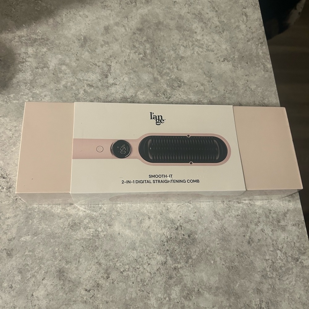 Brand new Lange straightening comb. Never even opened the box.